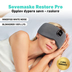 Kvinne med Sovemaske Restore Pro som blokkerer lys under søvn.
